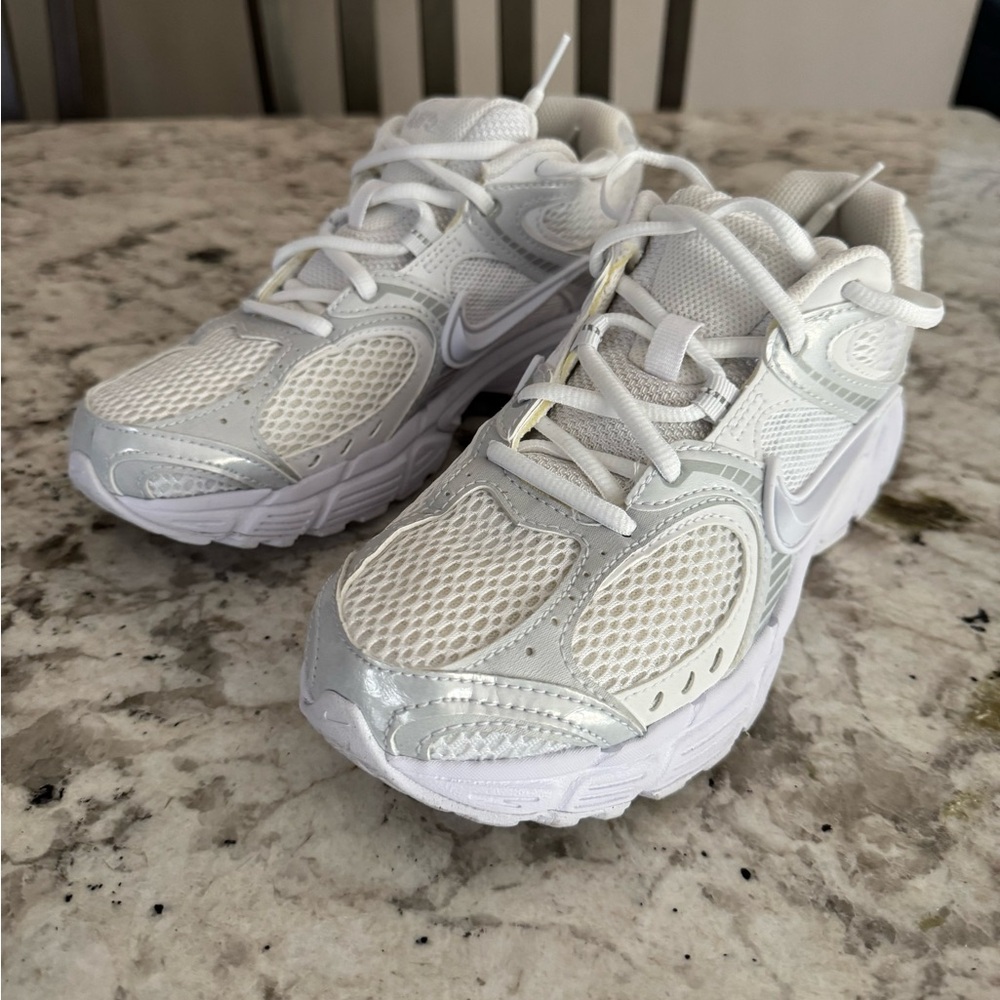 Nike Woman’s White and Silver Mesh Running Sneakers